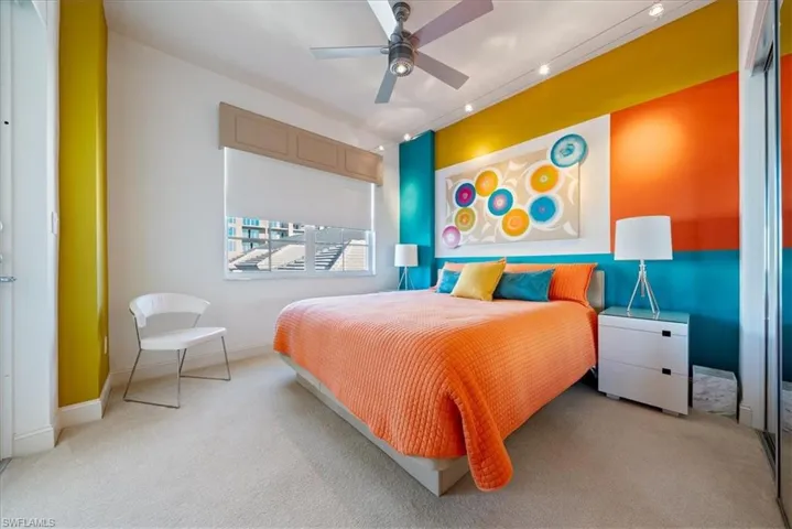 Bedroom featuring carpet floors and ceiling fan
