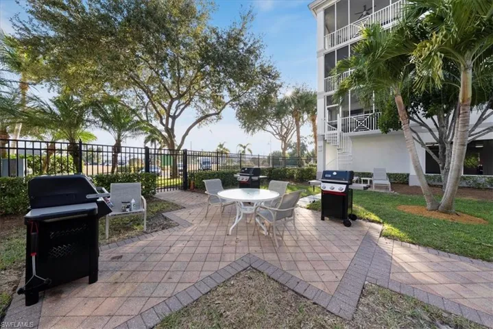 Patio / terrace with a patio area, area for grilling, and outdoor dining area