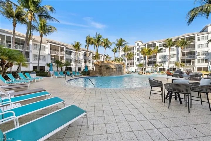 Community pool featuring a patio area