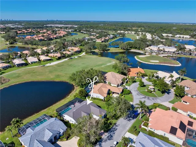 Aerial of expansive lake, golf and clubhouse views