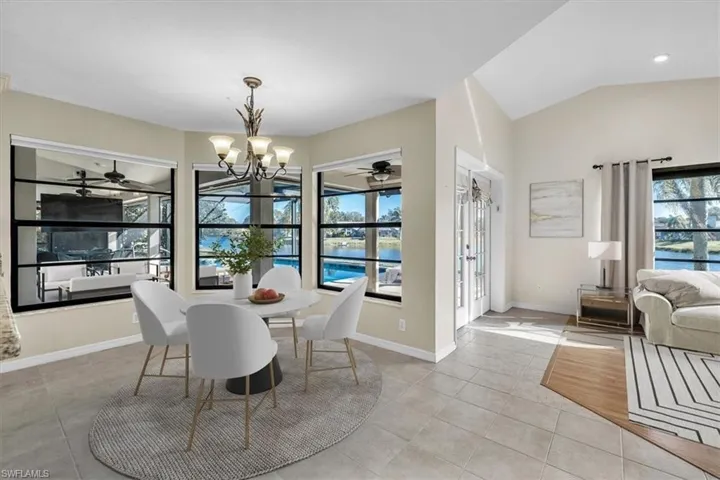 Staged Eat In Kitchen overlooking Pool and Lake!