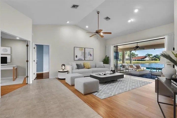 Staged Living Room with Panoramic Lake View!