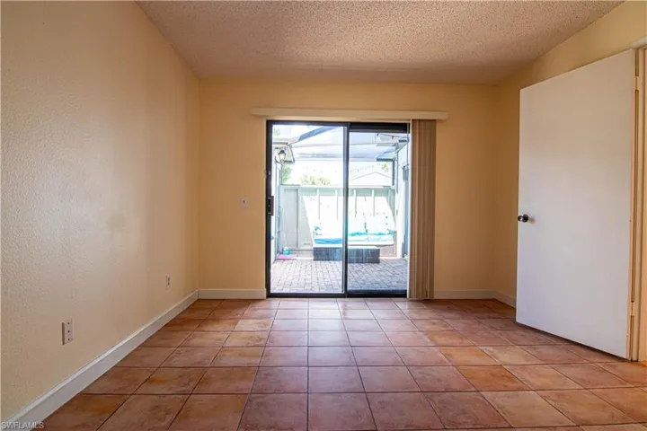 Enjoy courtyard access from the downstairs bedroom.