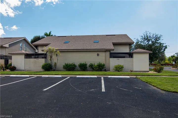 Side view of 8407 townhouse with easy parking!