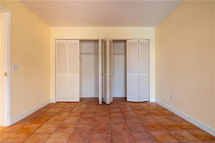 Downstairs' guest  bedroom has lots of closet space!