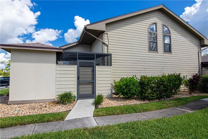 Enter through screen door into a private courtyard and to the front door!
