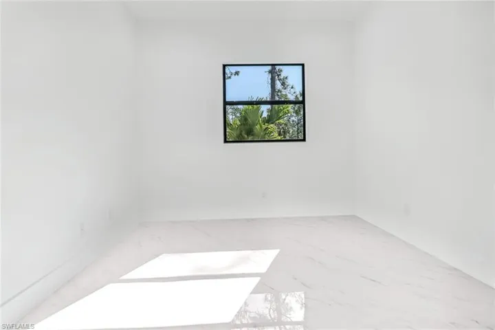 View of tiled spare room