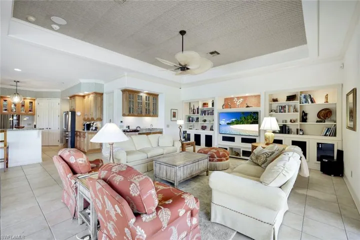 Huge Great Room with Built In- Bar, Beverage Refrigerator, Sink, Tray Ceiling, Custom Lighting