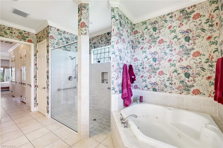 Oversized Jetted Spa Tub, Easy Entry- Walk In Glass Shower ( No Step)- Tiled with Natural Lighting