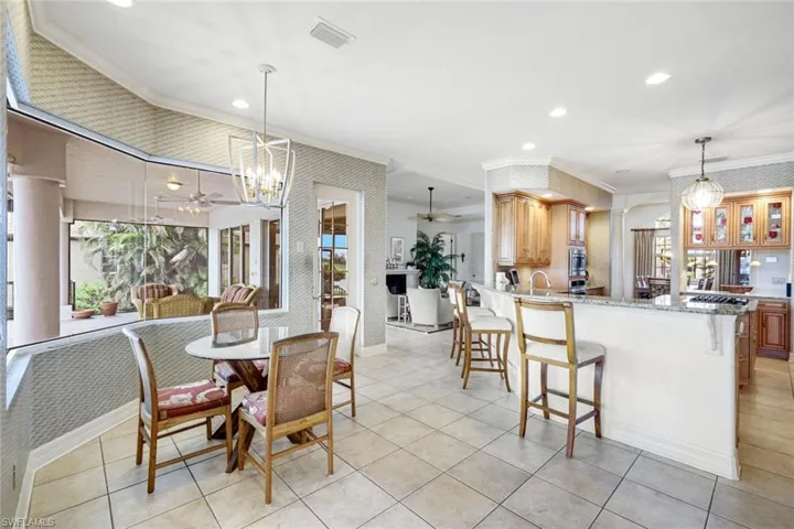 View Into Breakfast Nook and Spacious Kitchen