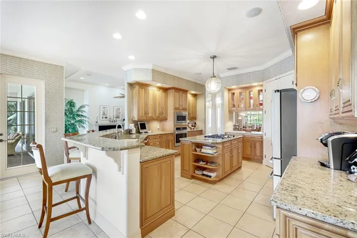 Center Island With Gas Cook Top, Wall Ovens, French Refrigerator, Counters Galore