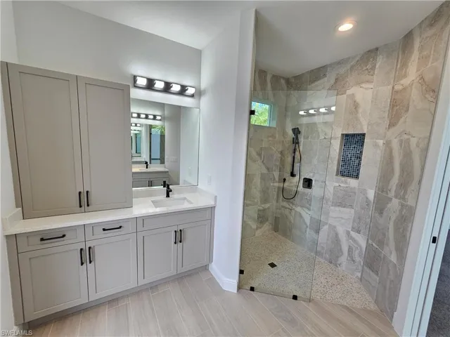 Junior-suite bathroom with large walk-in shower