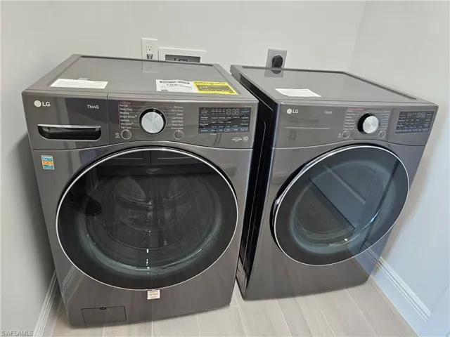 High capacity washer an dryer in black stainless steel