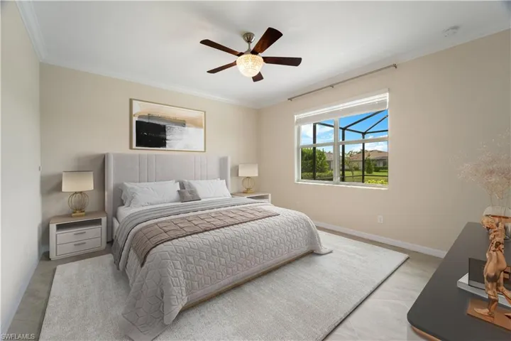 Virtually Staged Primary Bedroom featuring ceiling fan, crown molding, en suite bath and large walk in closet.