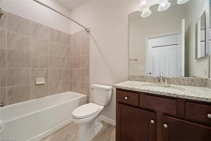 Full bathroom with shower / bathtub combination en suite bedroom 4