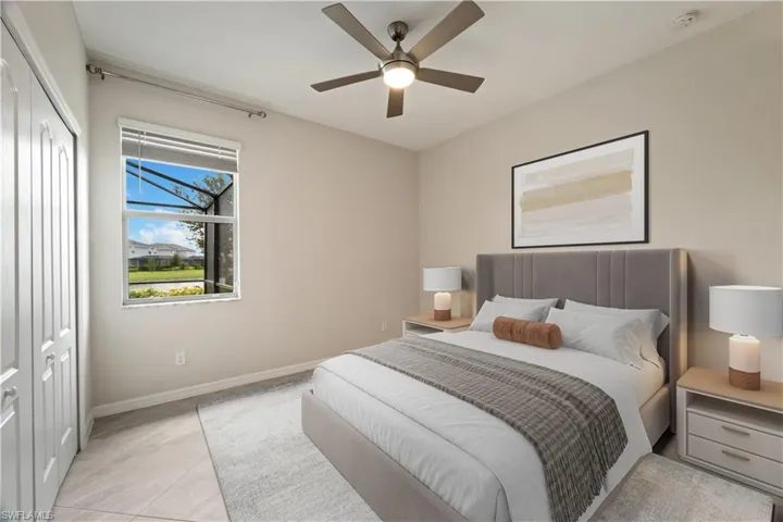 Bedroom 2 featuring a closet and ceiling fan