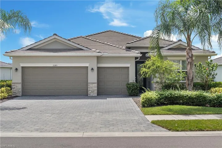 View of front facade featuring a 3 car garage