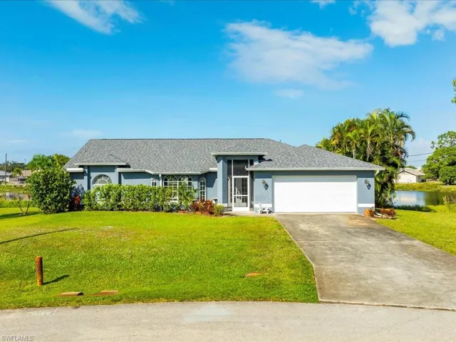 Two car garage and new roof pool home on a triple lot