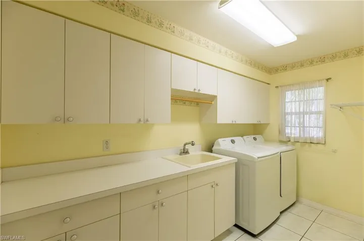 Separate Laundry Room off garage entrance