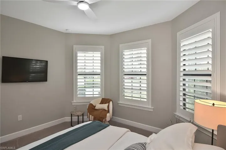 Bedroom featuring ceiling fan