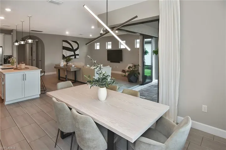 Dining room featuring light tile patterned floors