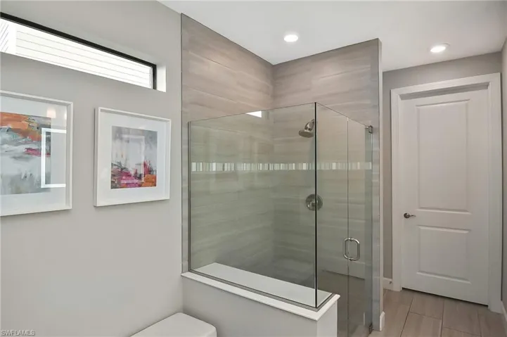 Bathroom featuring walk in shower
