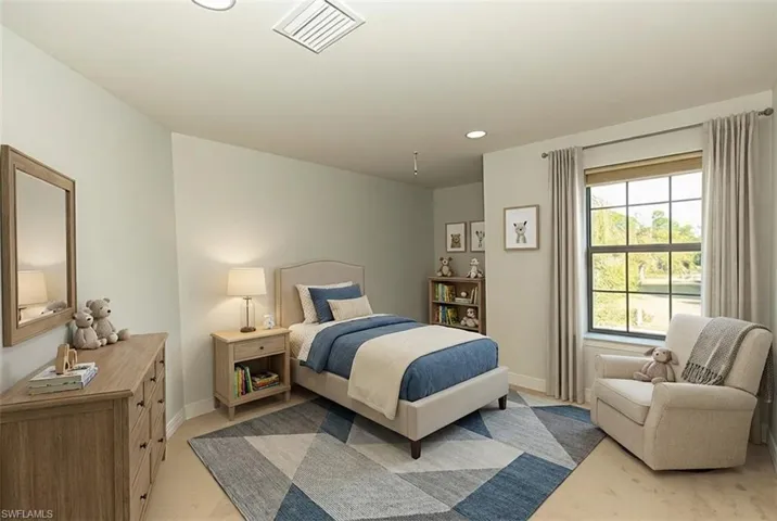Bedroom featuring baseboards and recessed lighting