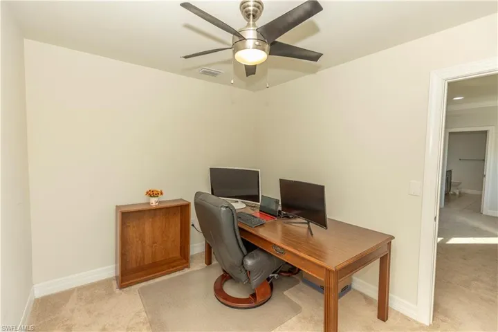 separate room in the primary bedroom that could be another walk in closet with a window