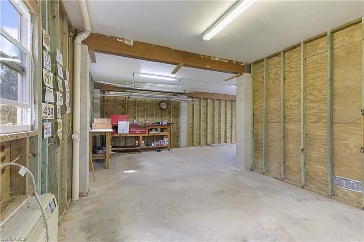 Empty room with wood finished floors and baseboards