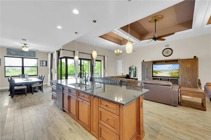 Fully upgraded Kitchen featuring recessed lighting, stainless steel appliances, a DOUBLE OVEN, seamless backsplash, and granite countertops.
