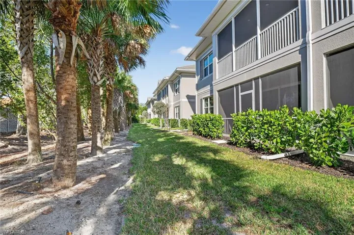 Surrounding community with a sunroom and a balcony