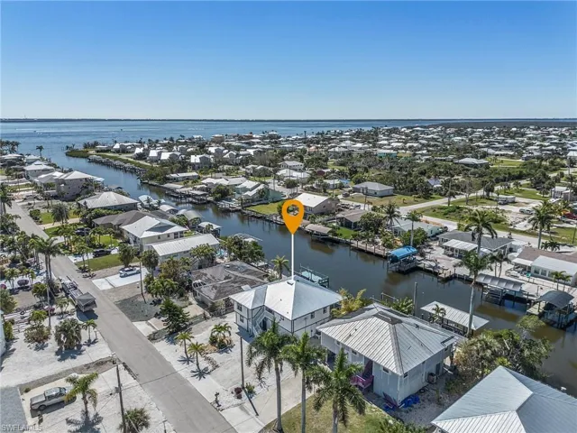 Yards from the Intracoastal Waterway and Sanibel in the background.