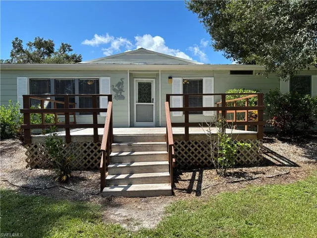 Front Porch with railing.