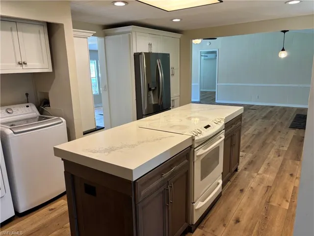 Beautiful Kitchen with stainless steel appliances. LG Washer and Dryer included.