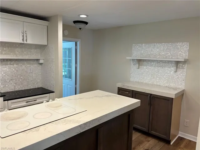 Extra cabinets, shelves and countertops.