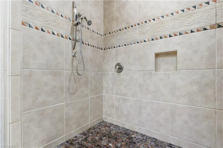 Bathroom with tiled shower