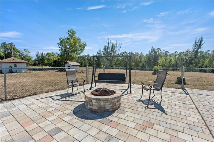 View of patio / terrace featuring a fire pit