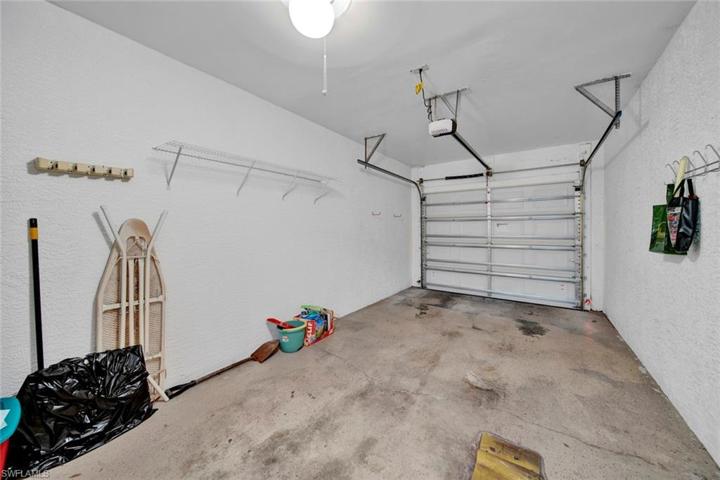 1-car attached garage has room for storage