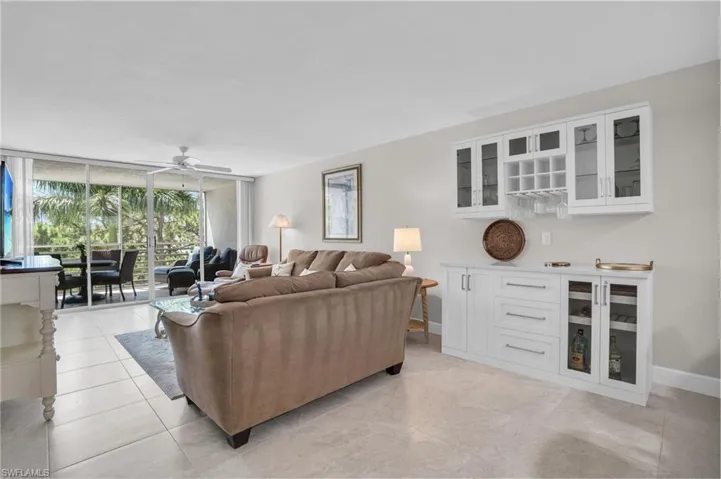 Living Room with Views of Screened Balcony