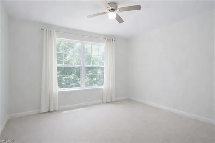 bedroom 2 upstairs with walk-in closet