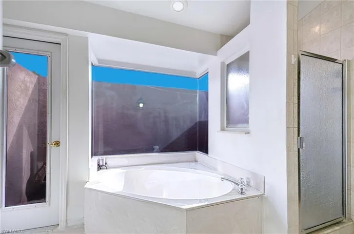 Bathroom with independent shower and bath