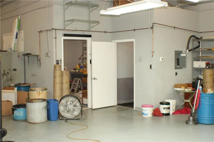 Garage featuring electric panel
