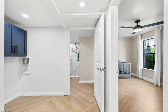 laundry room off guest bath and second bedroom downstairs
