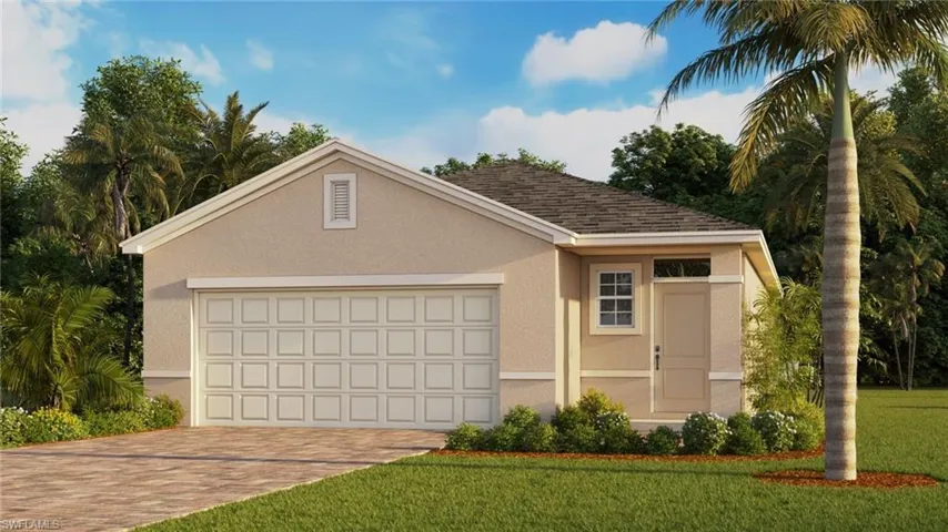 Garage featuring decorative driveway