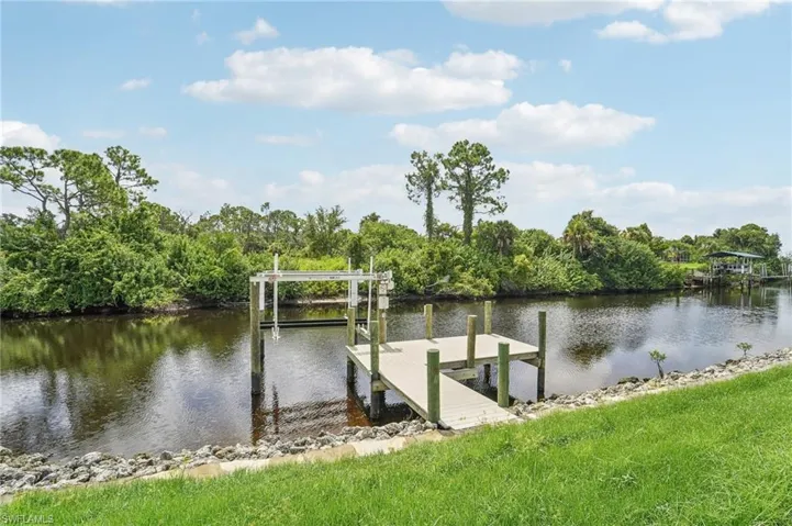 Waterfront property with a private dock and boat lift
