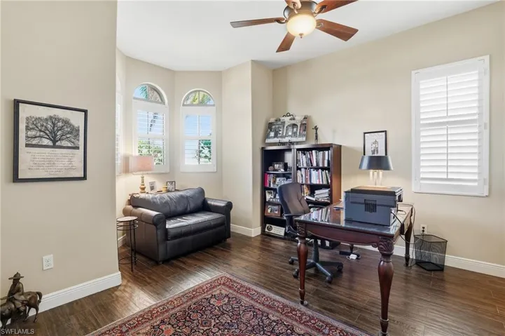 Office/Bedroom 4 featuring wood finished floors and ceiling fan