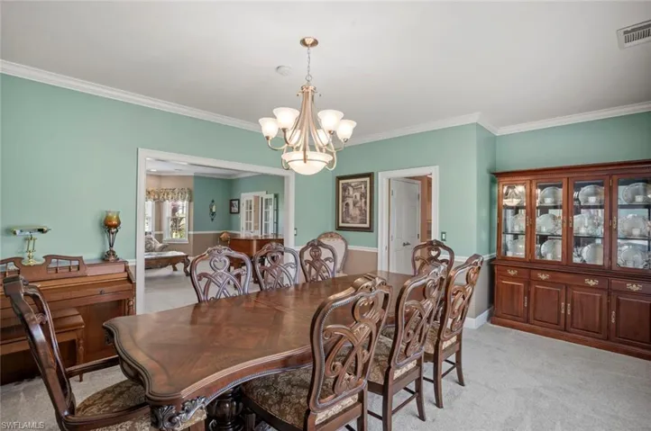 Formal dining looking into formal living area