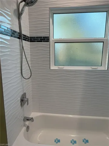 Guest Bathroom with Dual Sinks, Tub Shower Combination