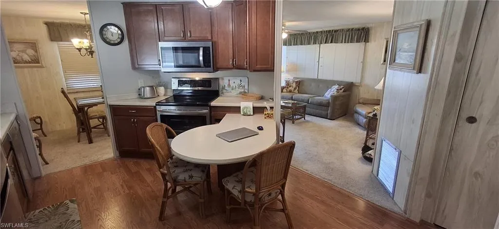 Kitchen with appliances with stainless steel finishes