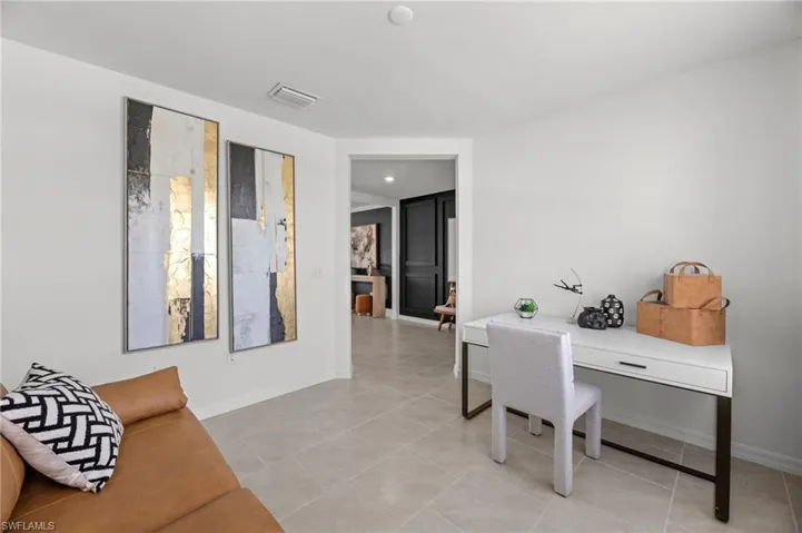 Neutral wall tones complement the light-toned tile flooring